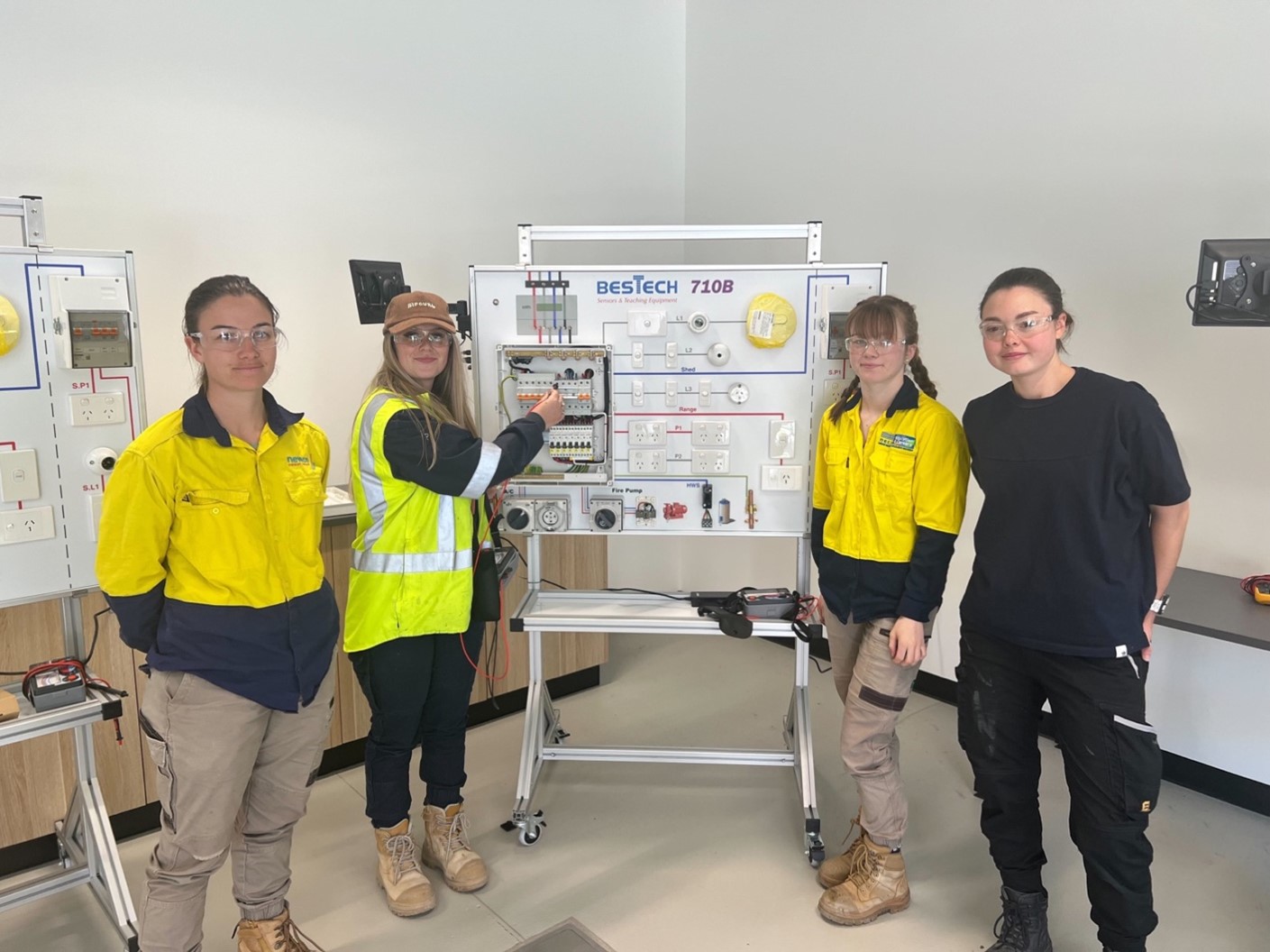 Current TasTAFE electrotechnology apprentices pose for photo in the classroom