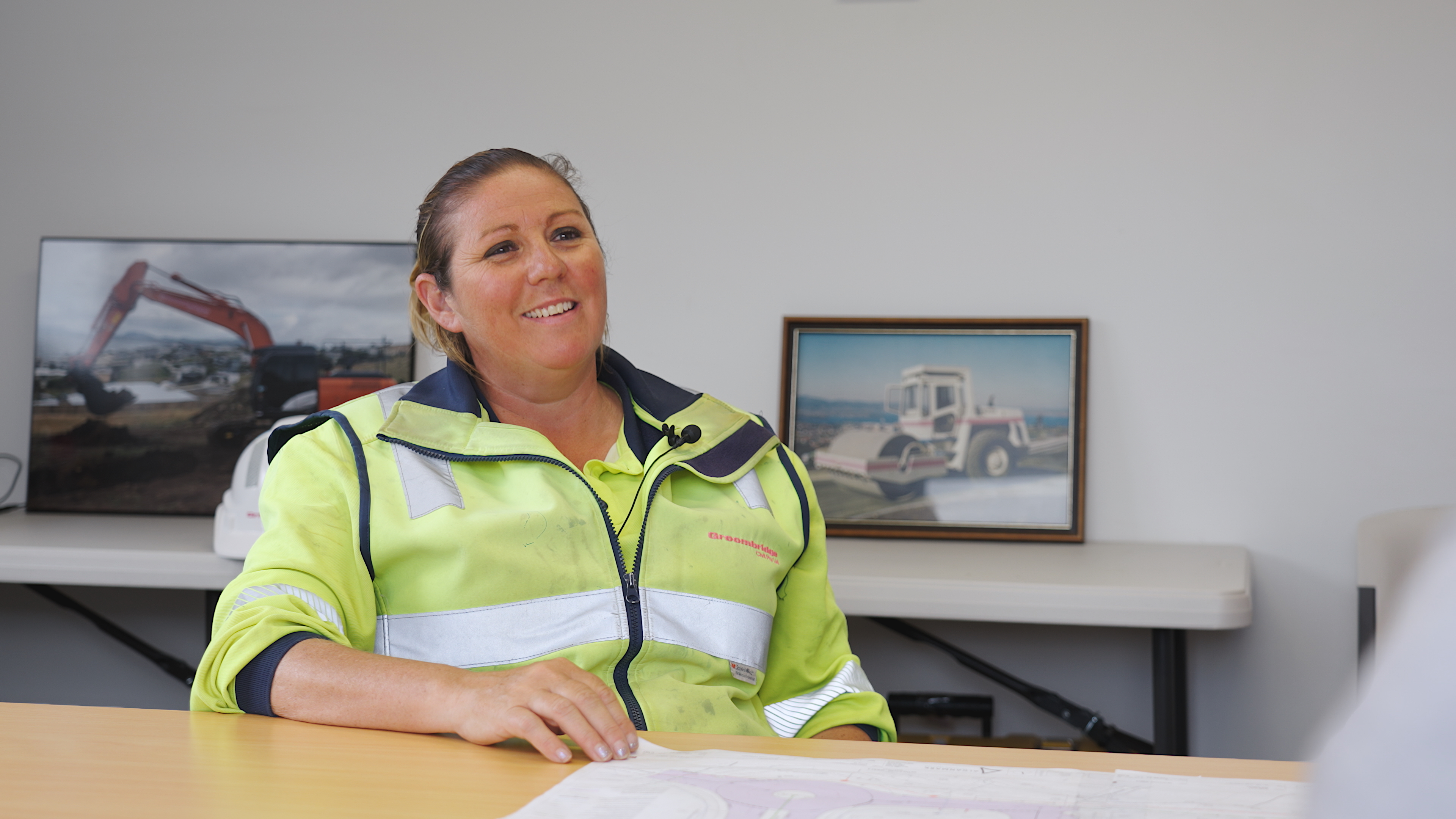 Lynette Richards sitting on a chair smiling