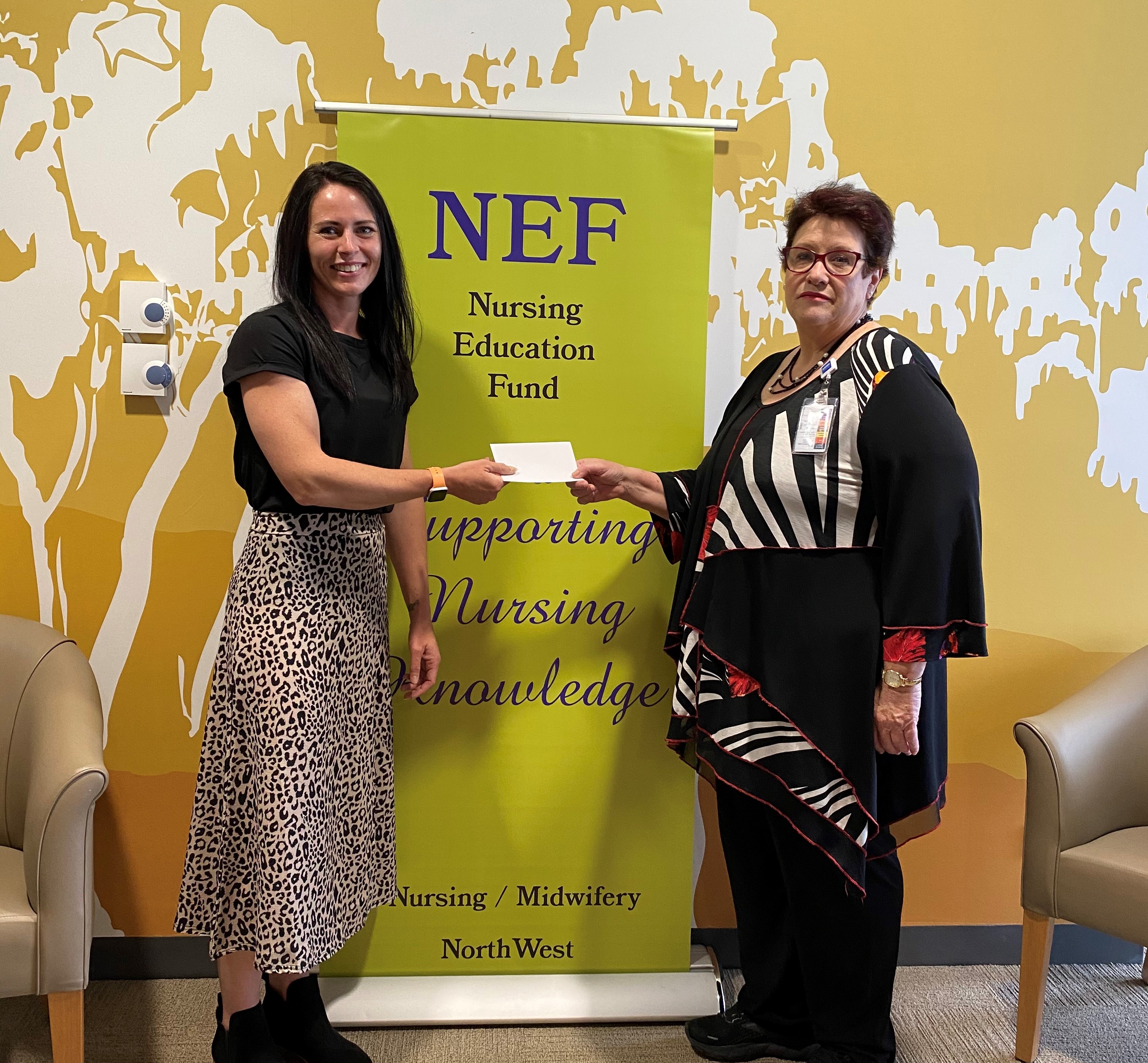 Michelle Gillet accepting her NEF scholarship 
