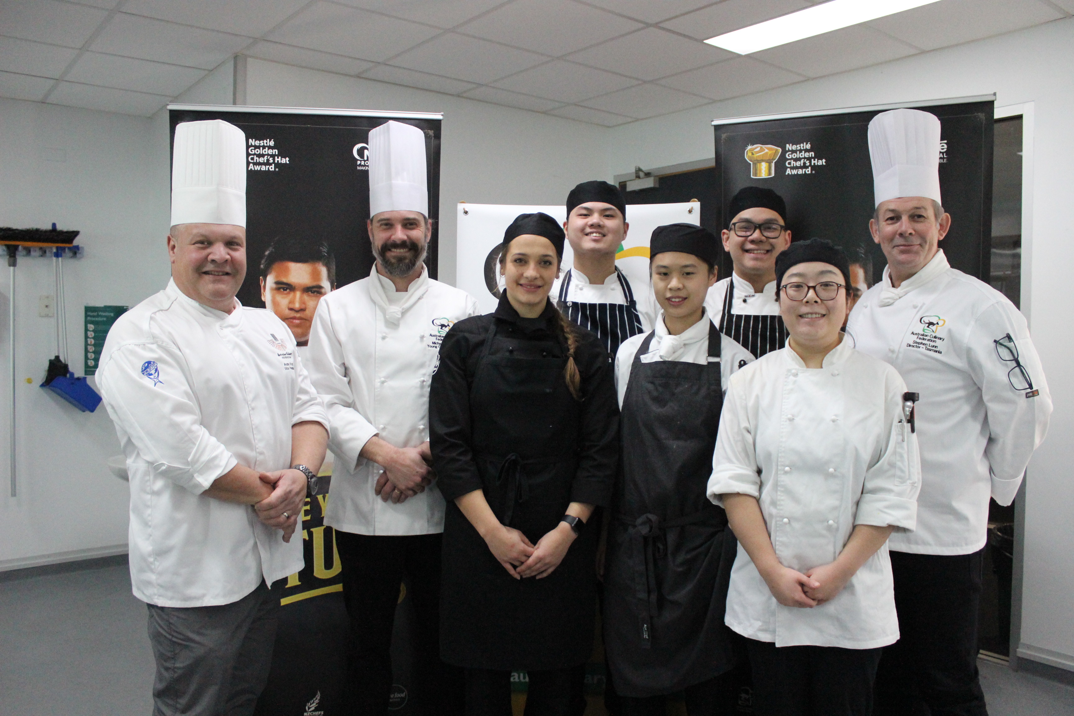 Golden Chefs Hat competitors pose with the judges