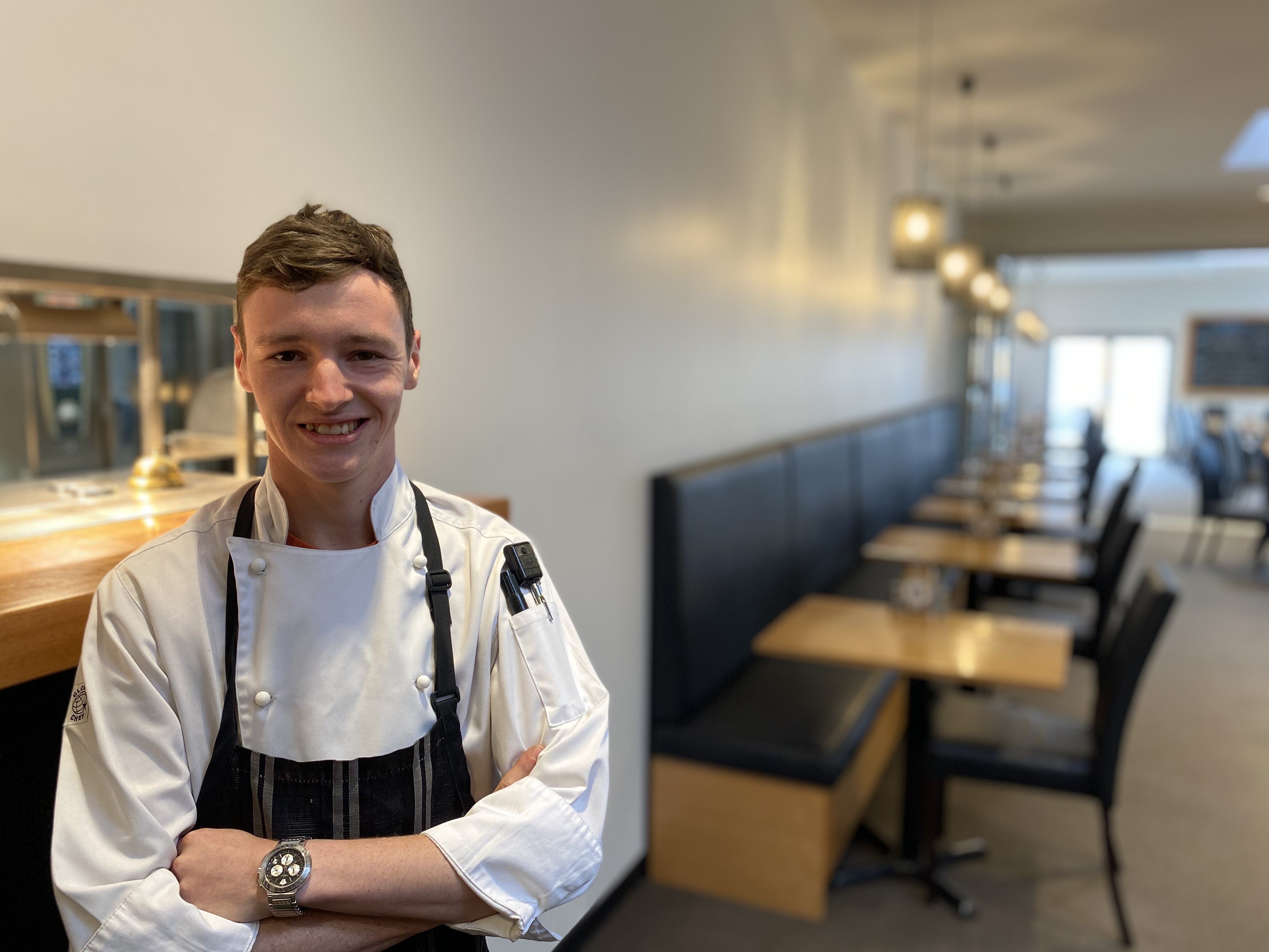 Cookery apprentice poses for photo as a 2021 Tasmanian Training Awards Finalist