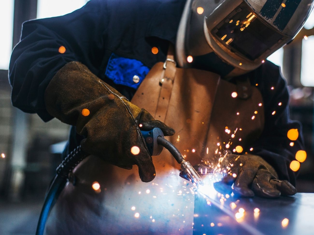 Welder welding some metal