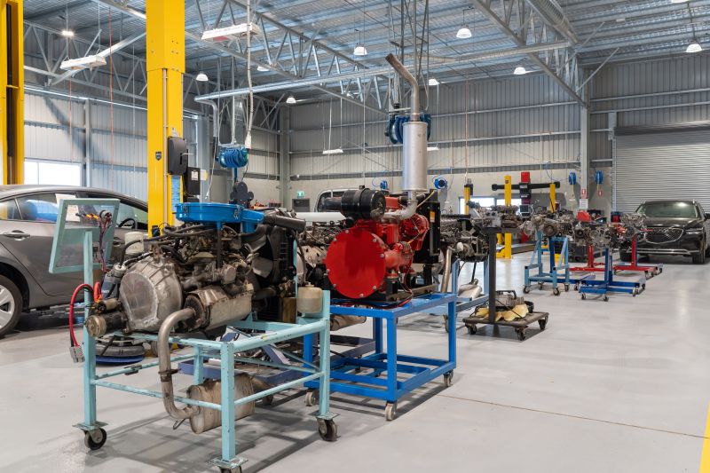 Engines removed from cars and mounted on blocks inside the new TasTAFE Automotive Training Facility.