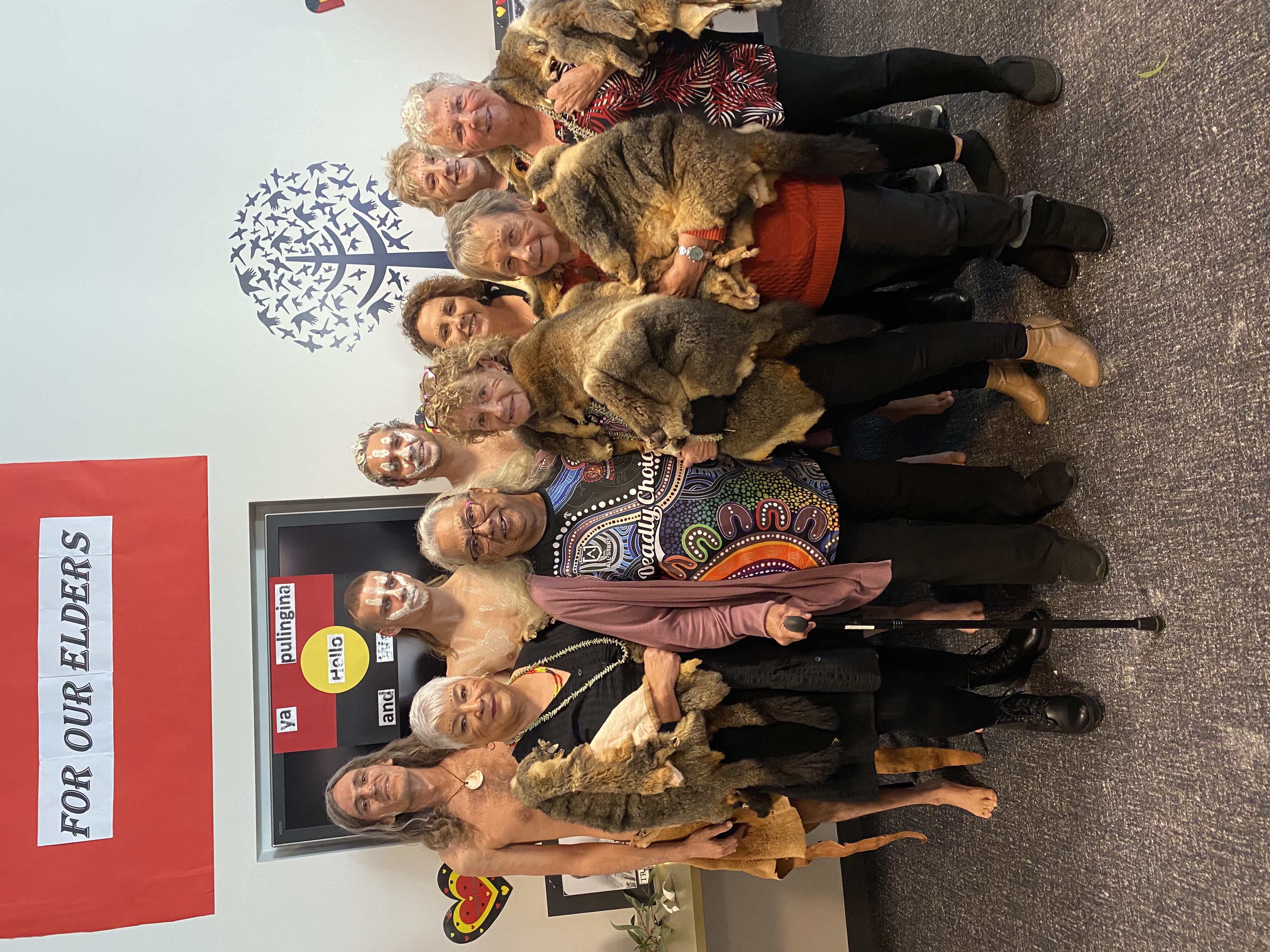 Group of aboriginal people standing for a photo