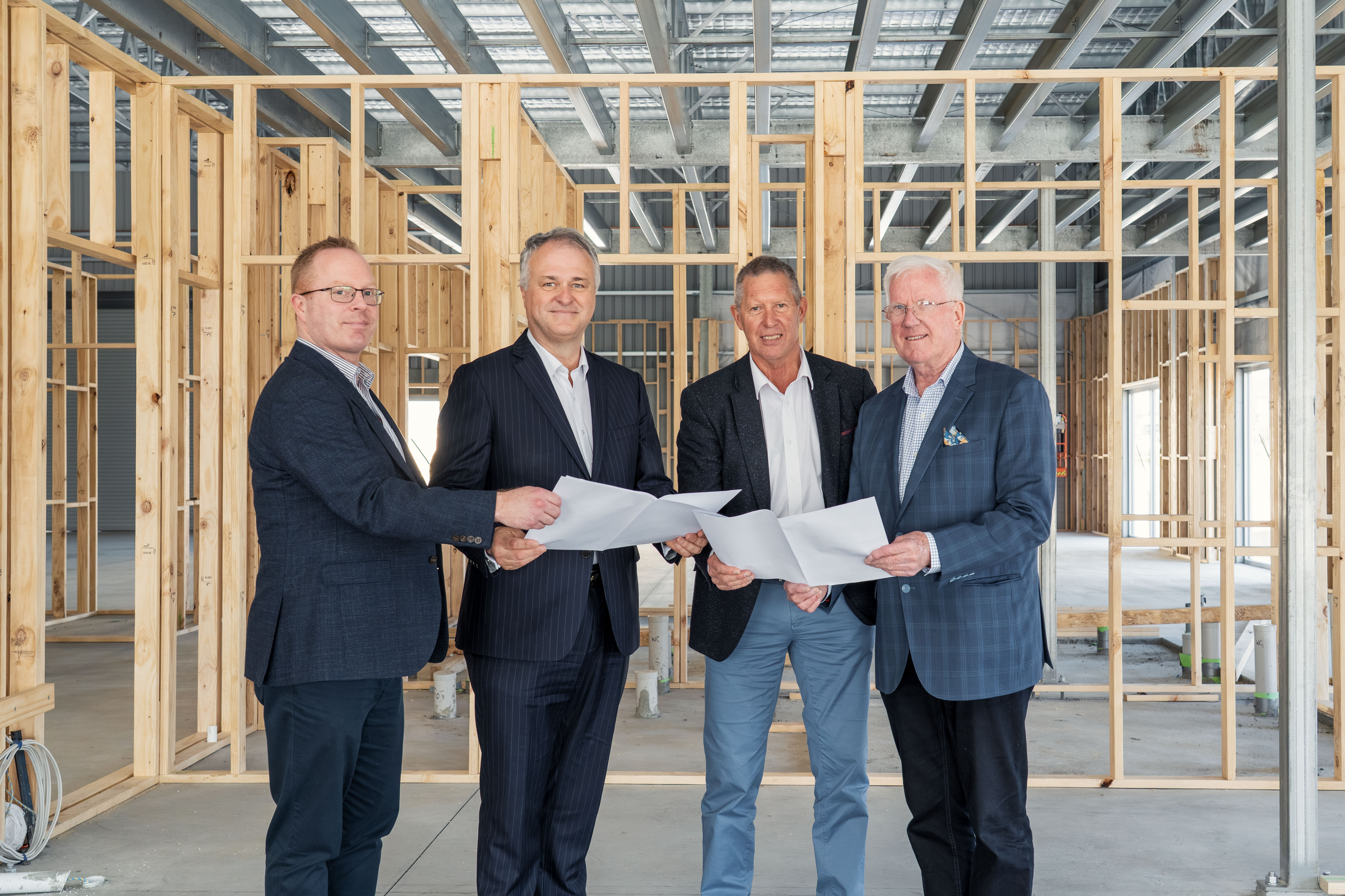 L-R: TasTAFE Interim CEO Will McShane, TACC CEO Peter A. Jones, TACC State Manager Bruce McIntosh, and developer Errol Stewart.