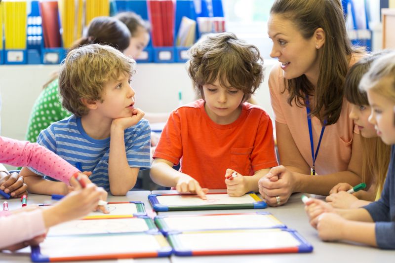 Teacher with children