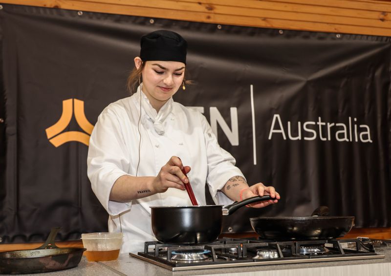 A girl wearing chef