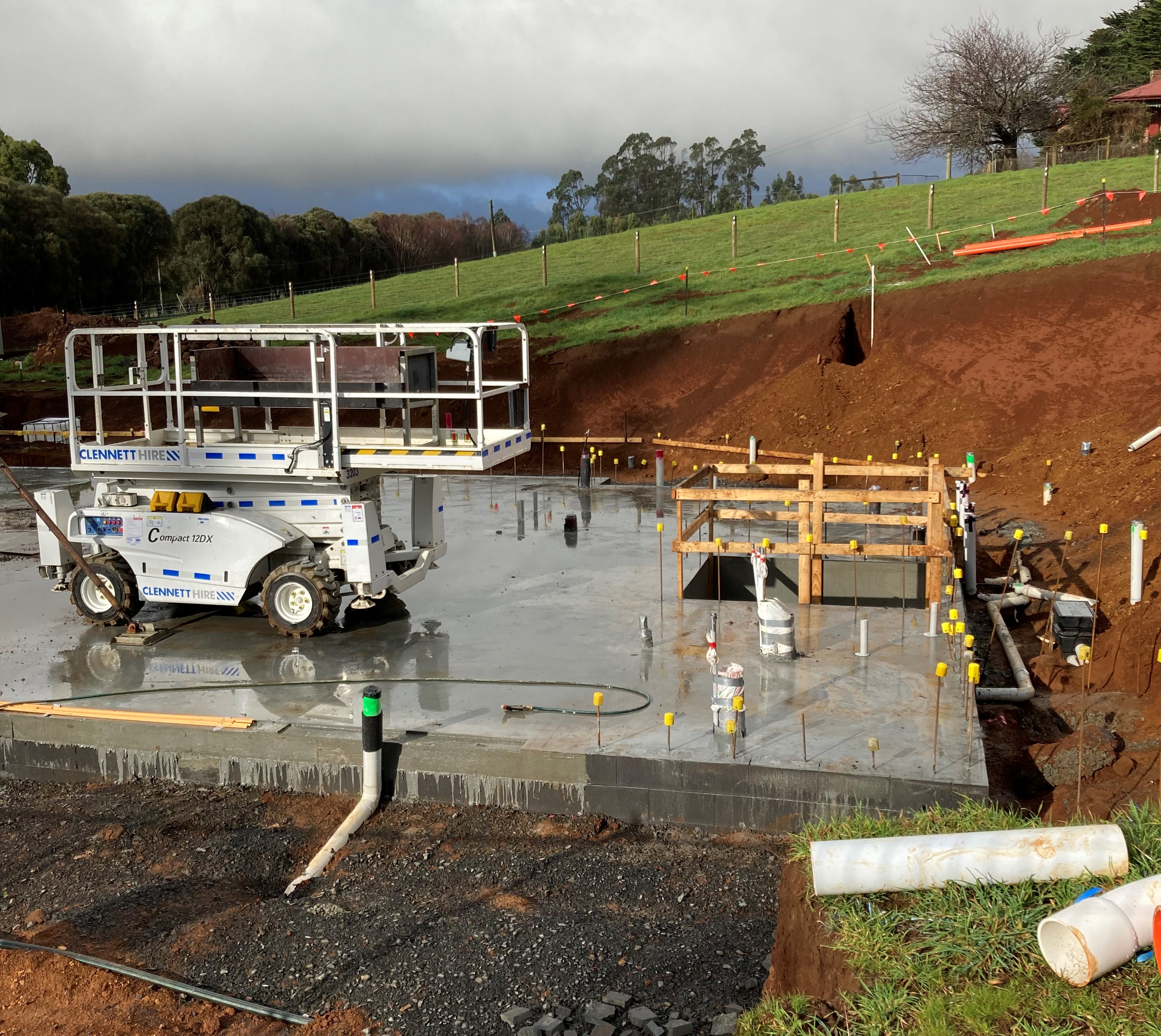 Scissor lift on a new concrete slab