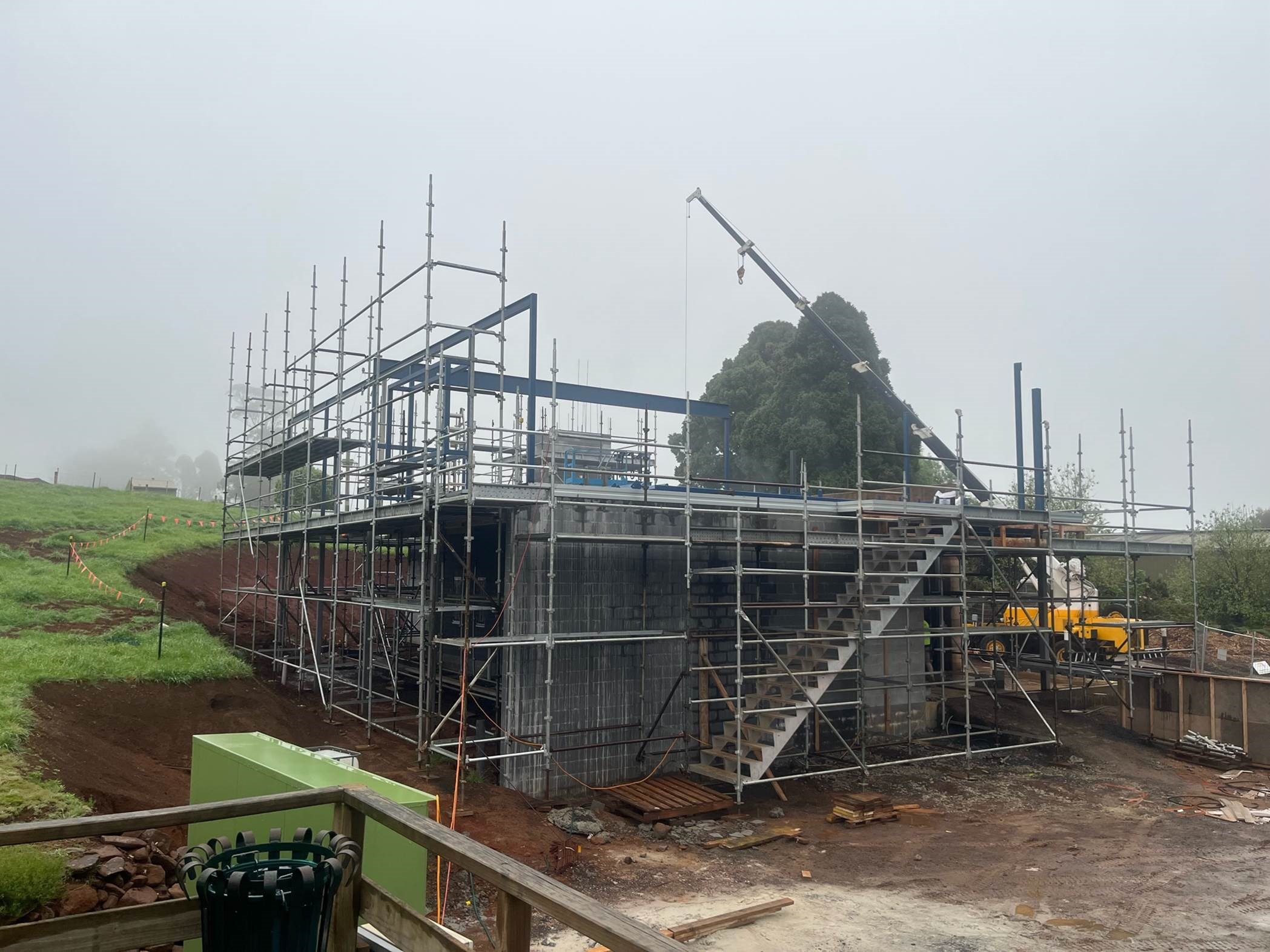 Agriculture centre of exceelence construction site with building and scaffolding around the outsides
