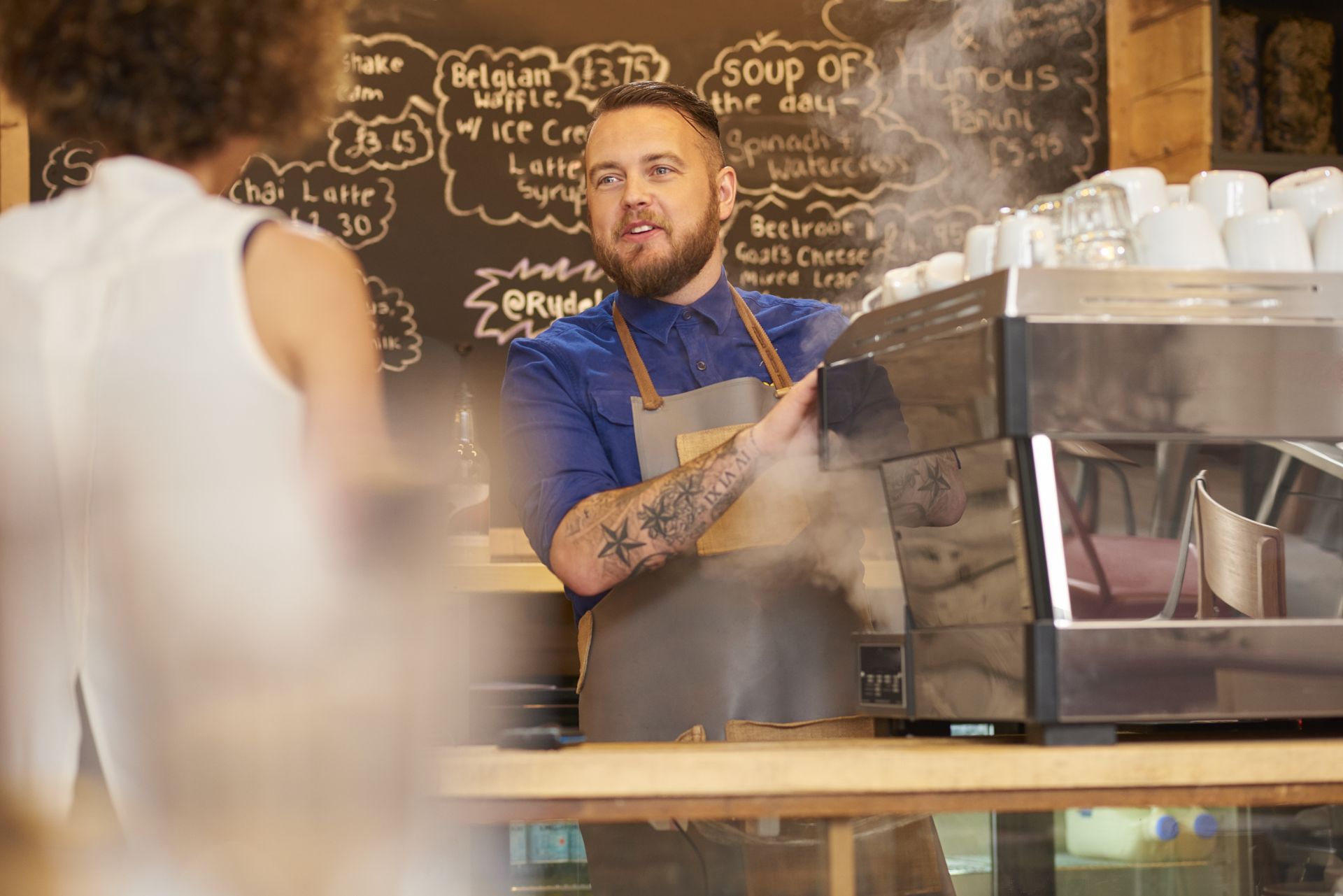 Barista making coffee