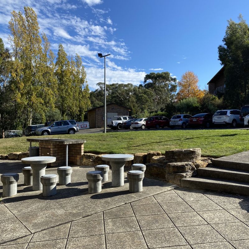 Outdoor Barbeque area with grass in the background